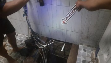 Polisi saat melakukan olah TKP warga tewas jatuh terperosok ke dalam sumur. Foto: Istimewa
